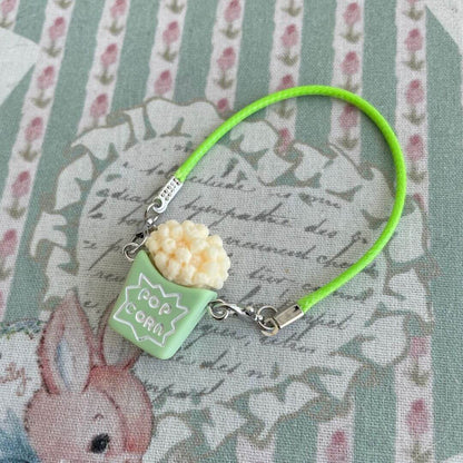Mini Popcorn Crossbody Bag, green with popcorn detail, perfect decoration for handmade plush kittens and small dolls.