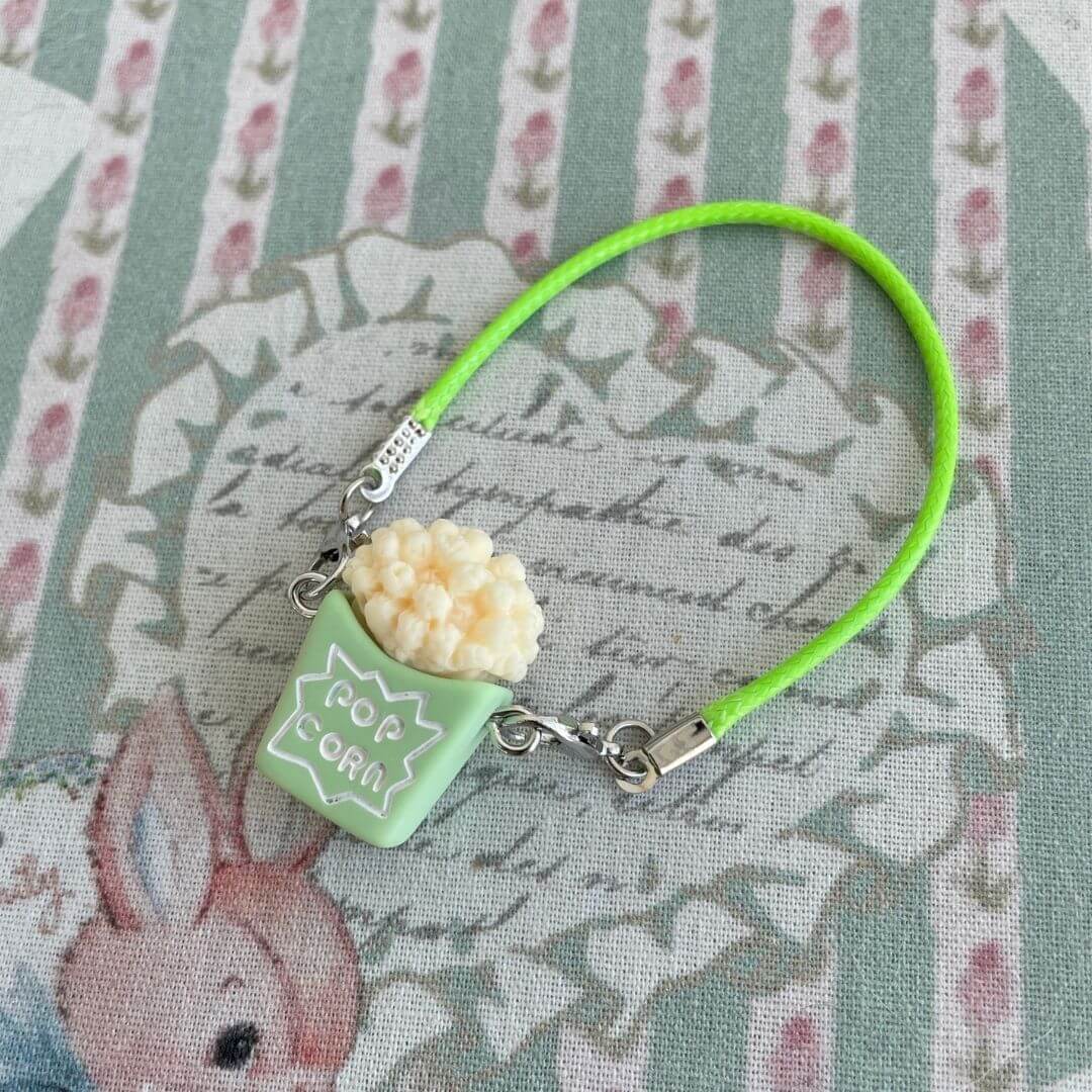 Mini Popcorn Crossbody Bag, green with popcorn detail, perfect decoration for handmade plush kittens and small dolls.