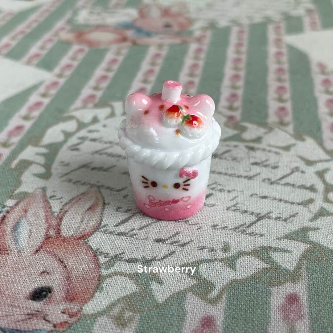 Mini cat-themed milkshake decoration with pink accents, perfect for dollhouse decor or as a gift for cat lovers. Ideal desk accessory.