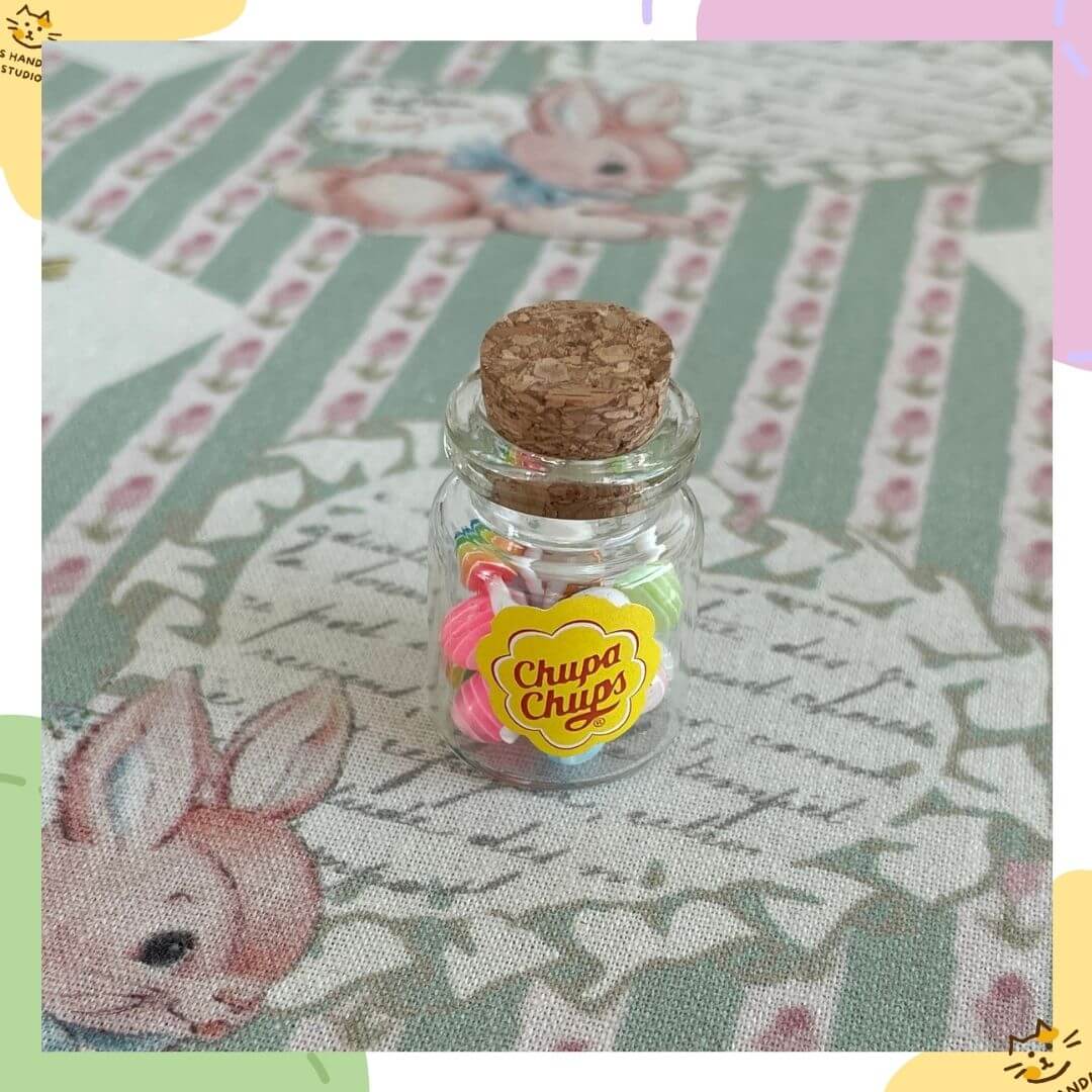 Miniature LolliJar with colorful candies, perfect for dollhouse decor or as a whimsical gift for collectors and cat lovers.