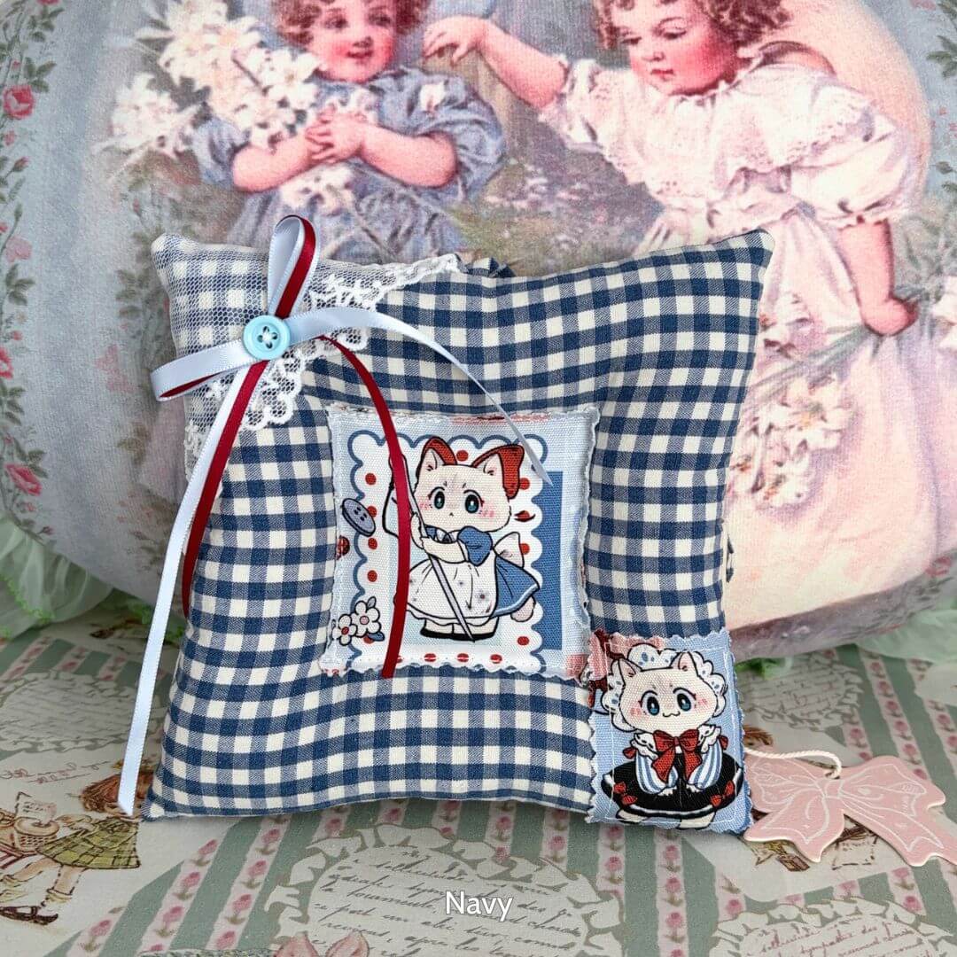 Kitten Coasters – For Cups and Kitten Display, handmade kitten fabric cushion featuring cute cat prints and decorative ribbon.