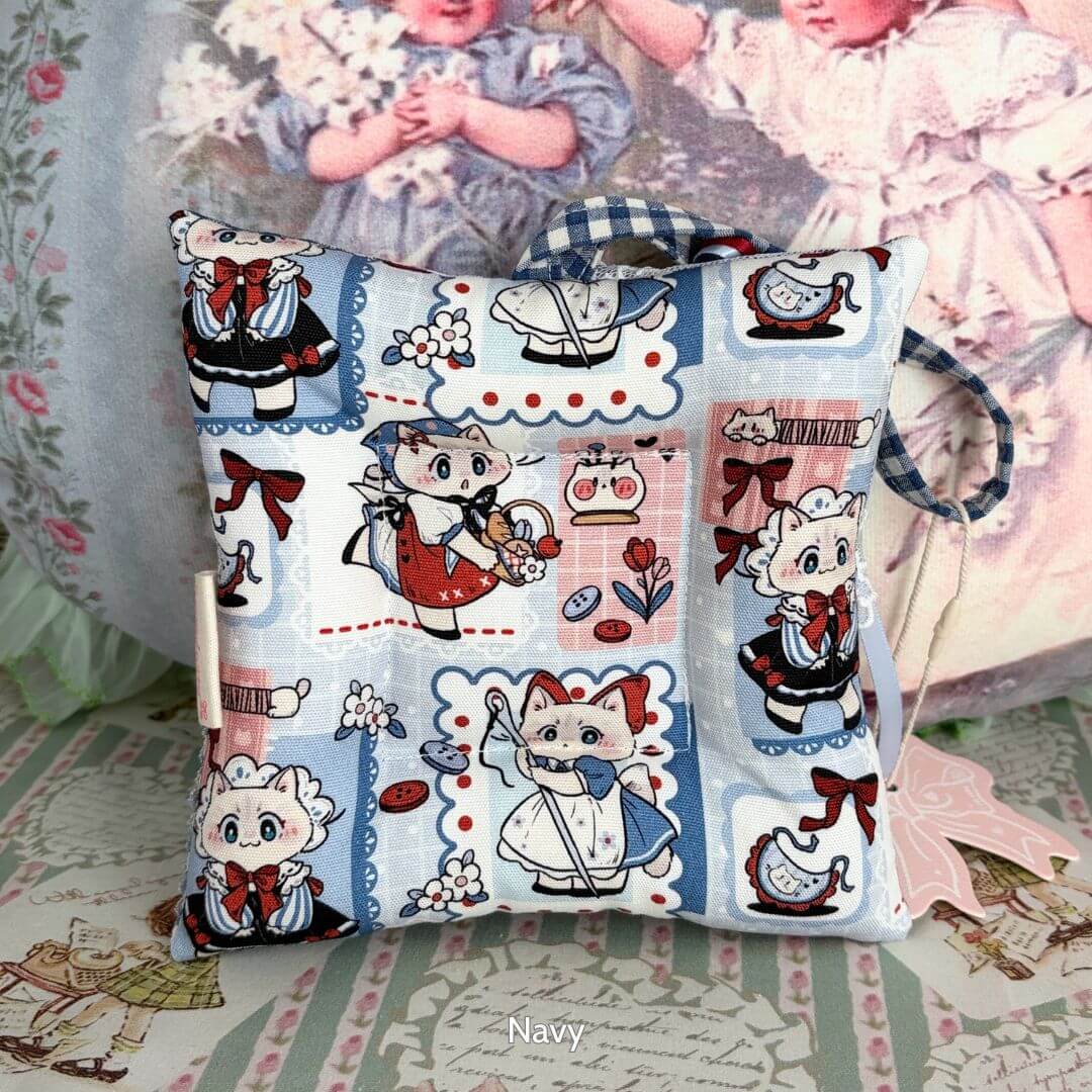 Kitten Coasters – For Cups and Kitten Display, featuring cute cat illustrations on decorative fabric in navy, perfect for home decor.