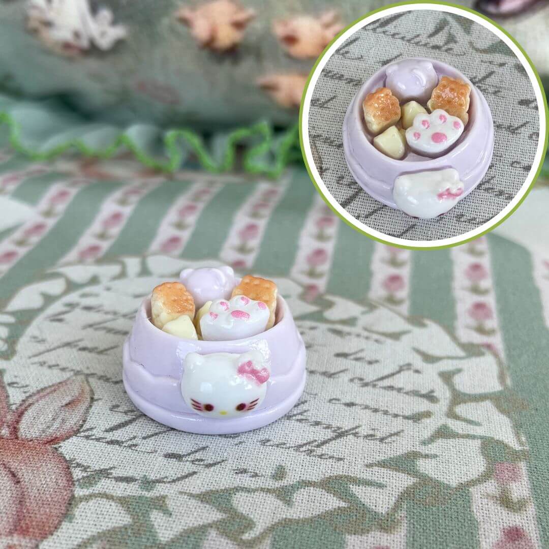 Cute PawPaw Bowl handmade plush toy of a kitten in a dessert cup with cat face design, perfect for a fancy feline accessory.