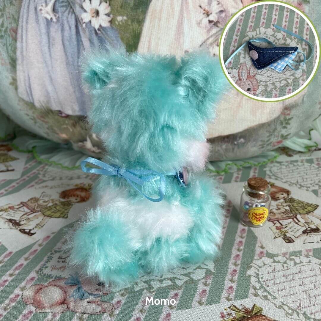 Retro Bunny Companions with fluffy turquoise fur and a blue bow, showcasing nostalgic charm and playful decor accents.