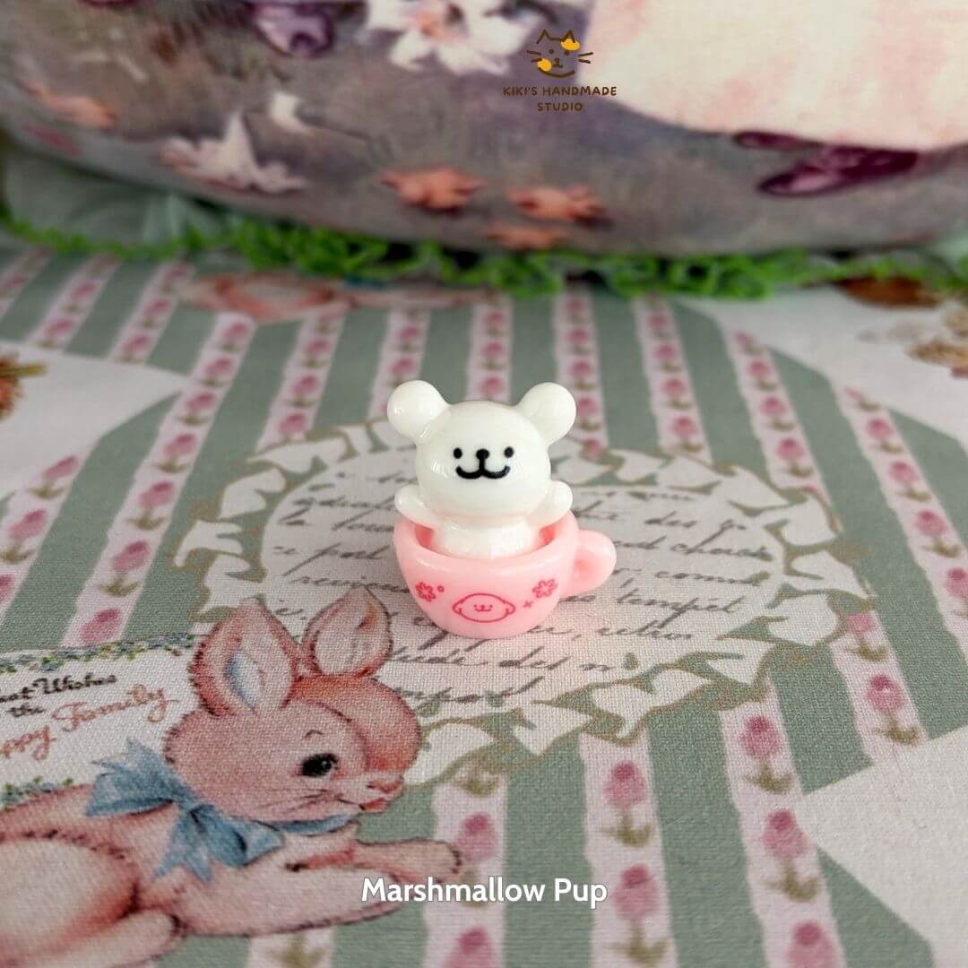 Tiny Puppy Cup featuring a cute white bear in a pink cup, handmade collectible decor with kawaii charm.