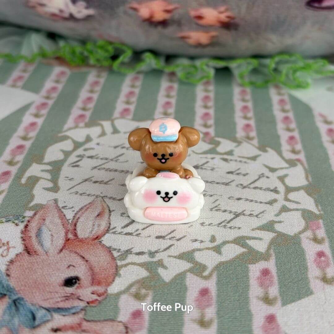 Puppy Car Mini Decor featuring a cute toffee-colored puppy wearing a blue hat, sitting on a pastel fluffy cloud.