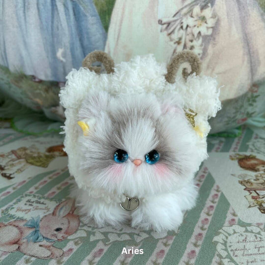 Handmade Aries kitten plush toy with faux fur and soft horns, part of the Zodiac Kitten Collection.